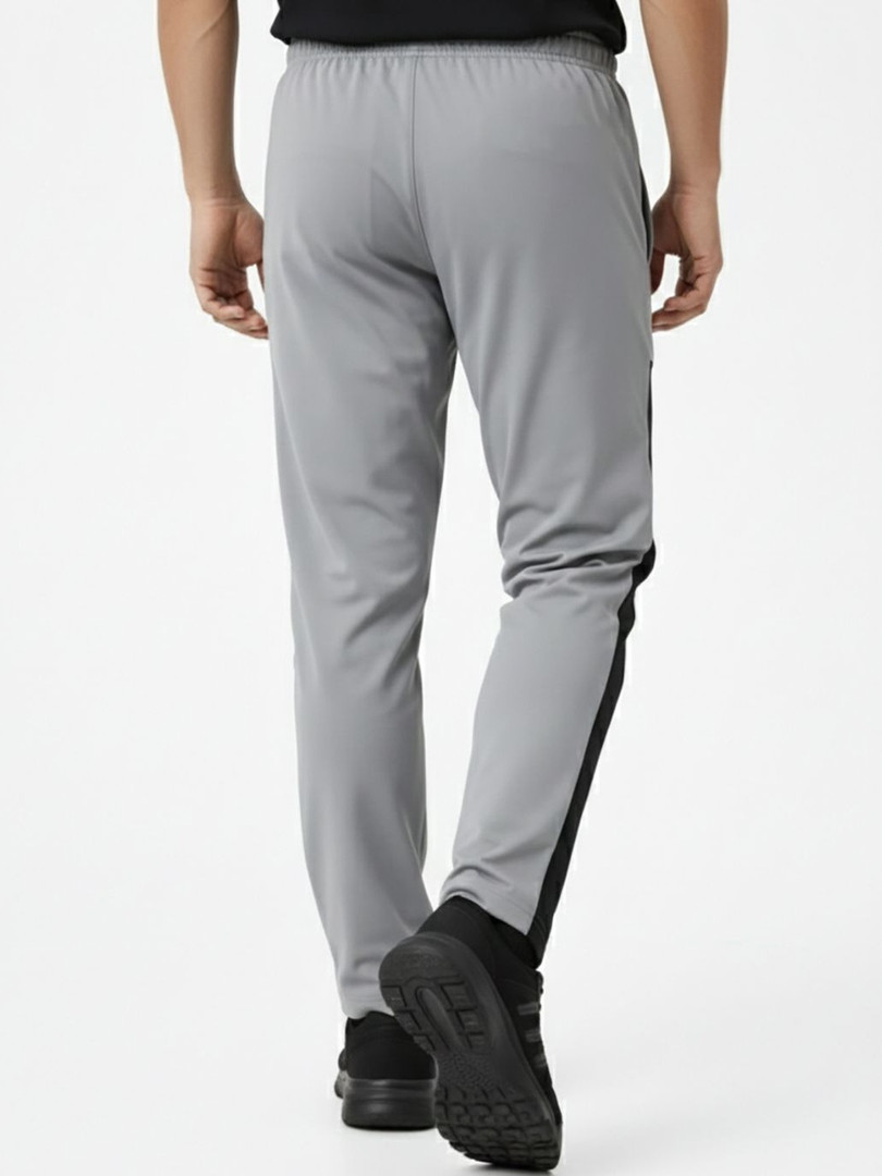 glitchez Men Relaxed Fit Self Design Training Track Pants